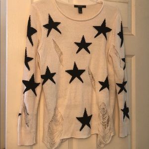 Distressed star sweater
